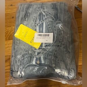 Light Blue Denim Jumper/Romper
Never worn. Never open
Runs big